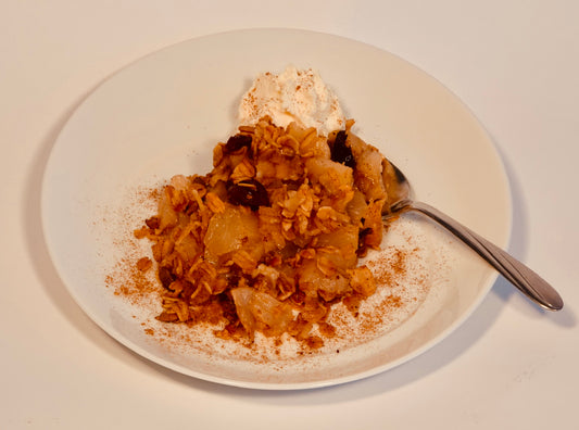 Granolala Apple Cranberry Crumble served on plate